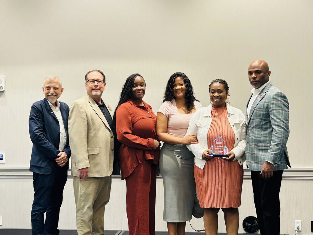 HACG Staff with NAHRO Award of Merit