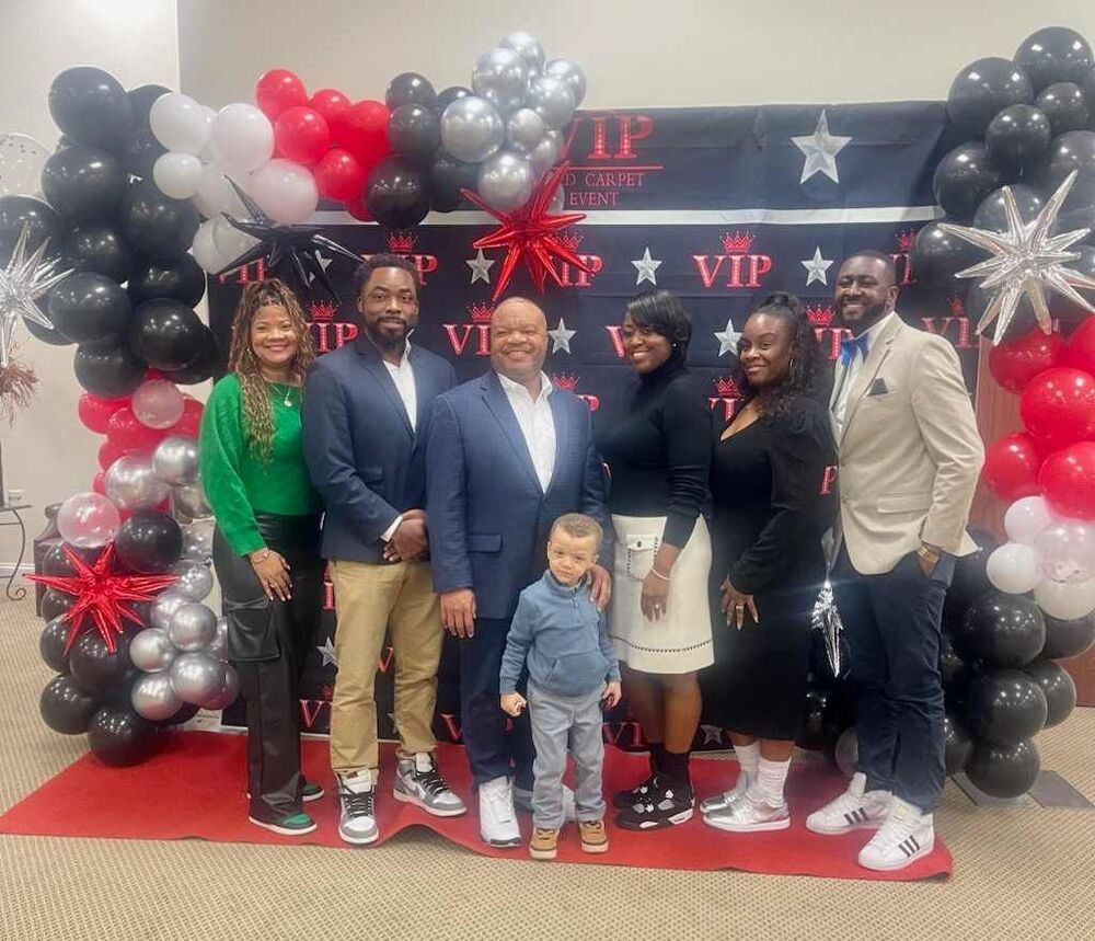 hacg staff posed in front of vip banner at serc mlk tournament